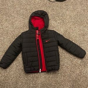 Nike black puffer coat. Size 5 small.